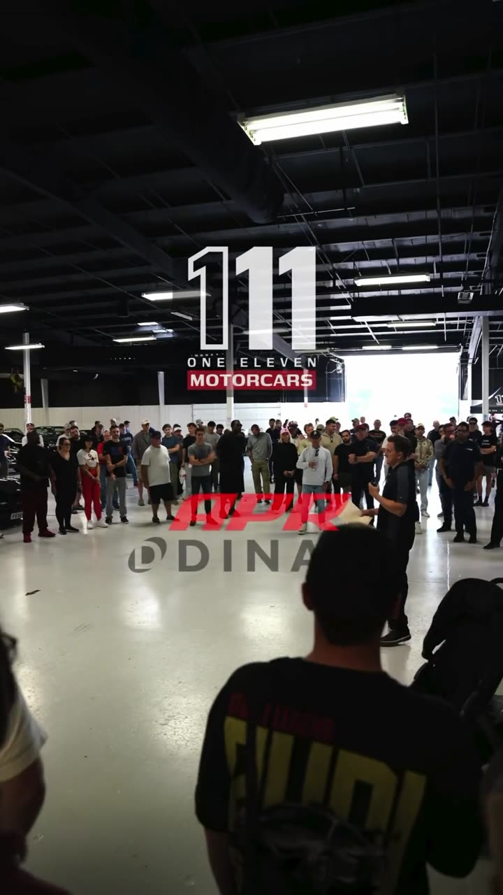 Crowd at the Dinan and APR event at 111 Motorcars
